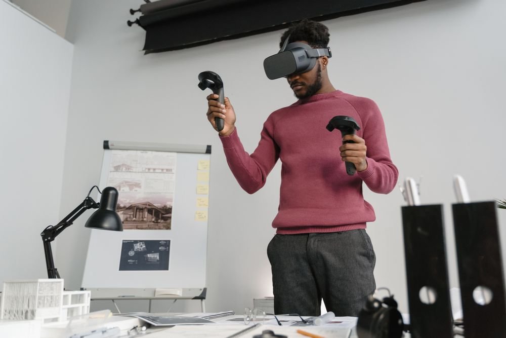 Architect exploring building designs in virtual reality in a bright studio